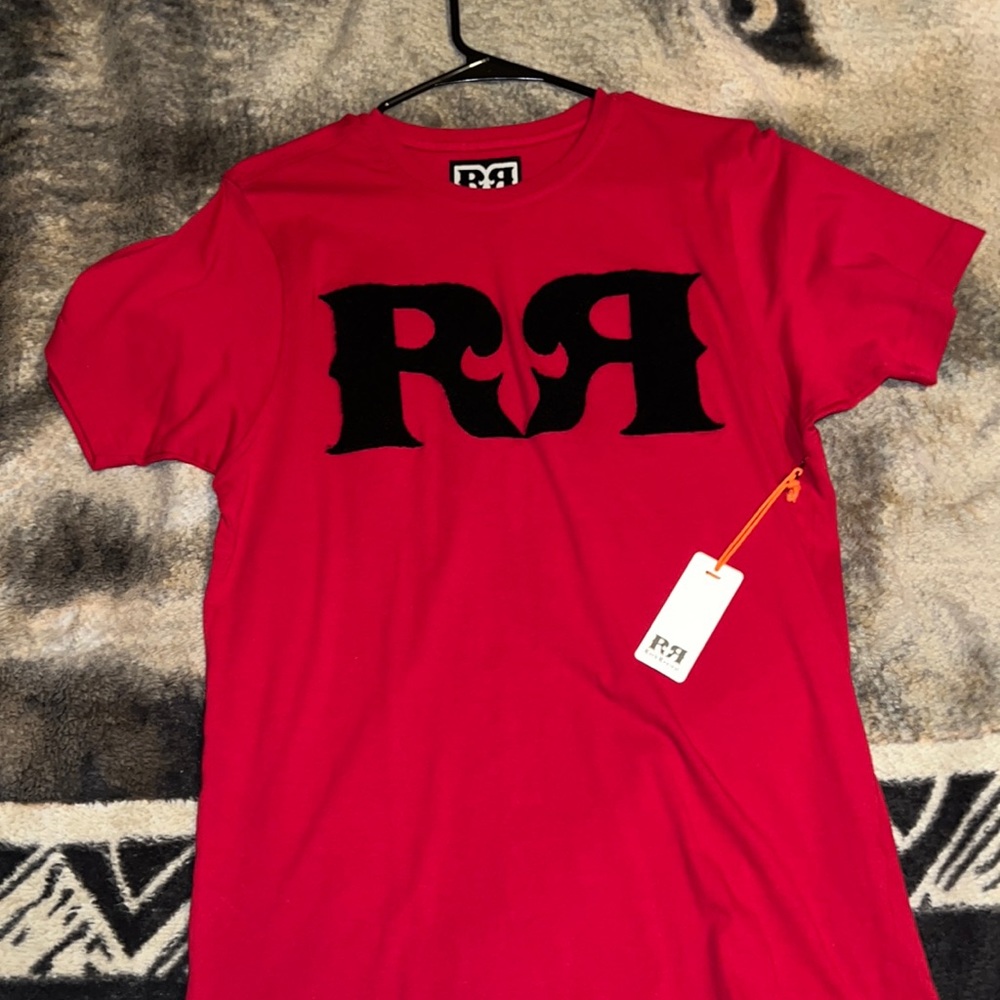 Men’s red Rock Revival t-shirt.
